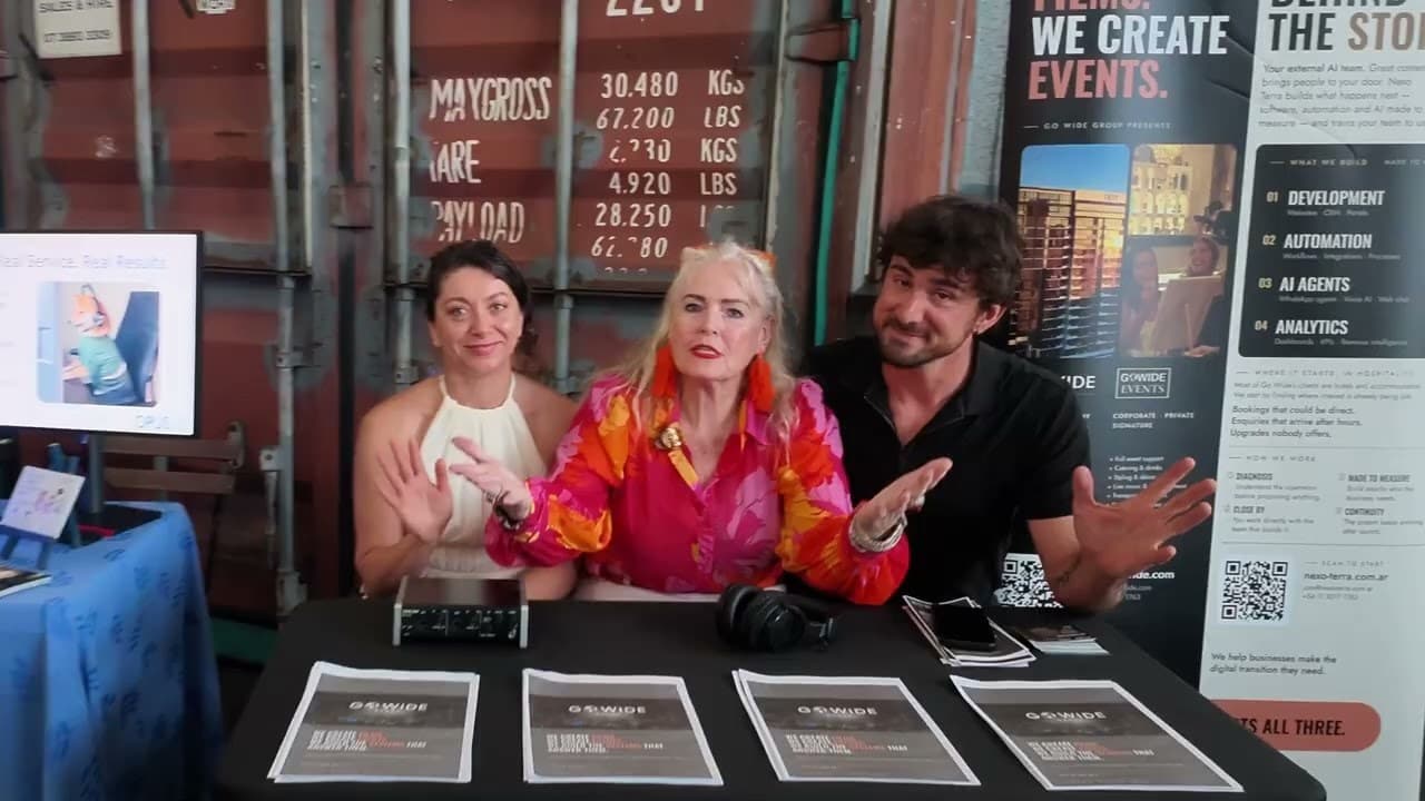 Three guests talking across an exhibitor table in The Laneway at Miami Marketta during Beyond Management Rights 2026.
