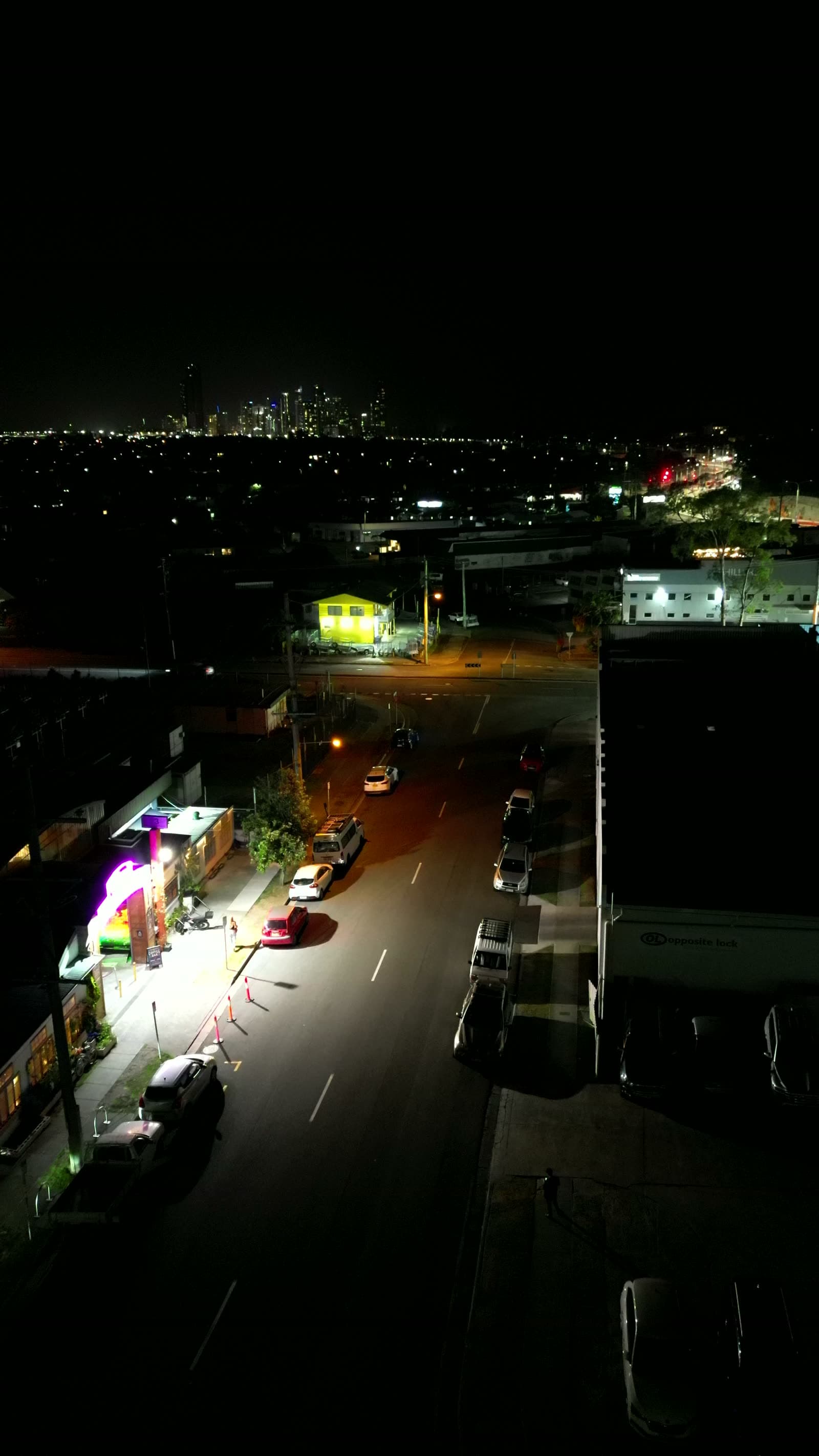 An elevated night view over Miami Marketta, with the Gold Coast skyline lit up in the distance.
